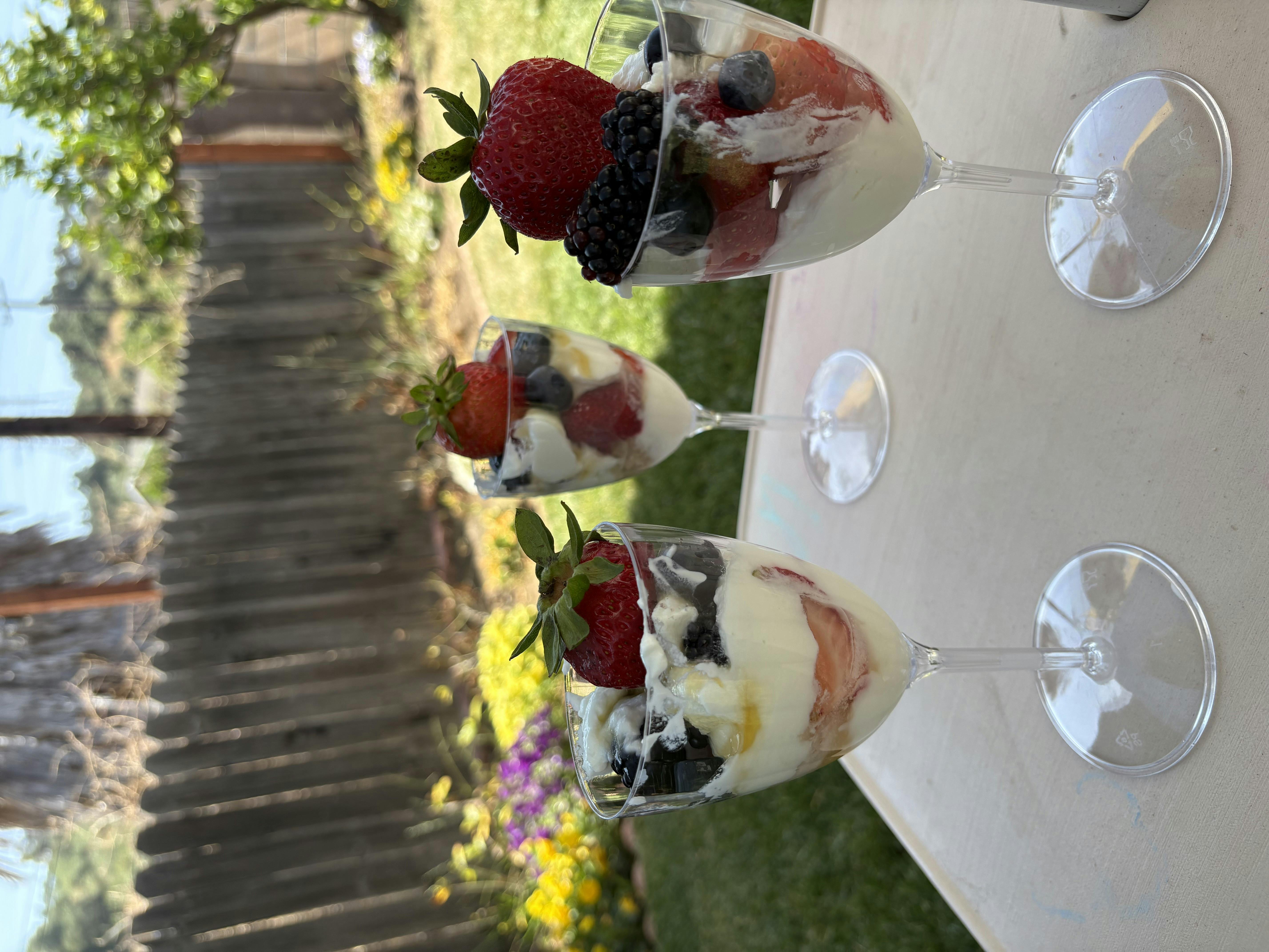 Three glasses of fruit and yogurt parfaits