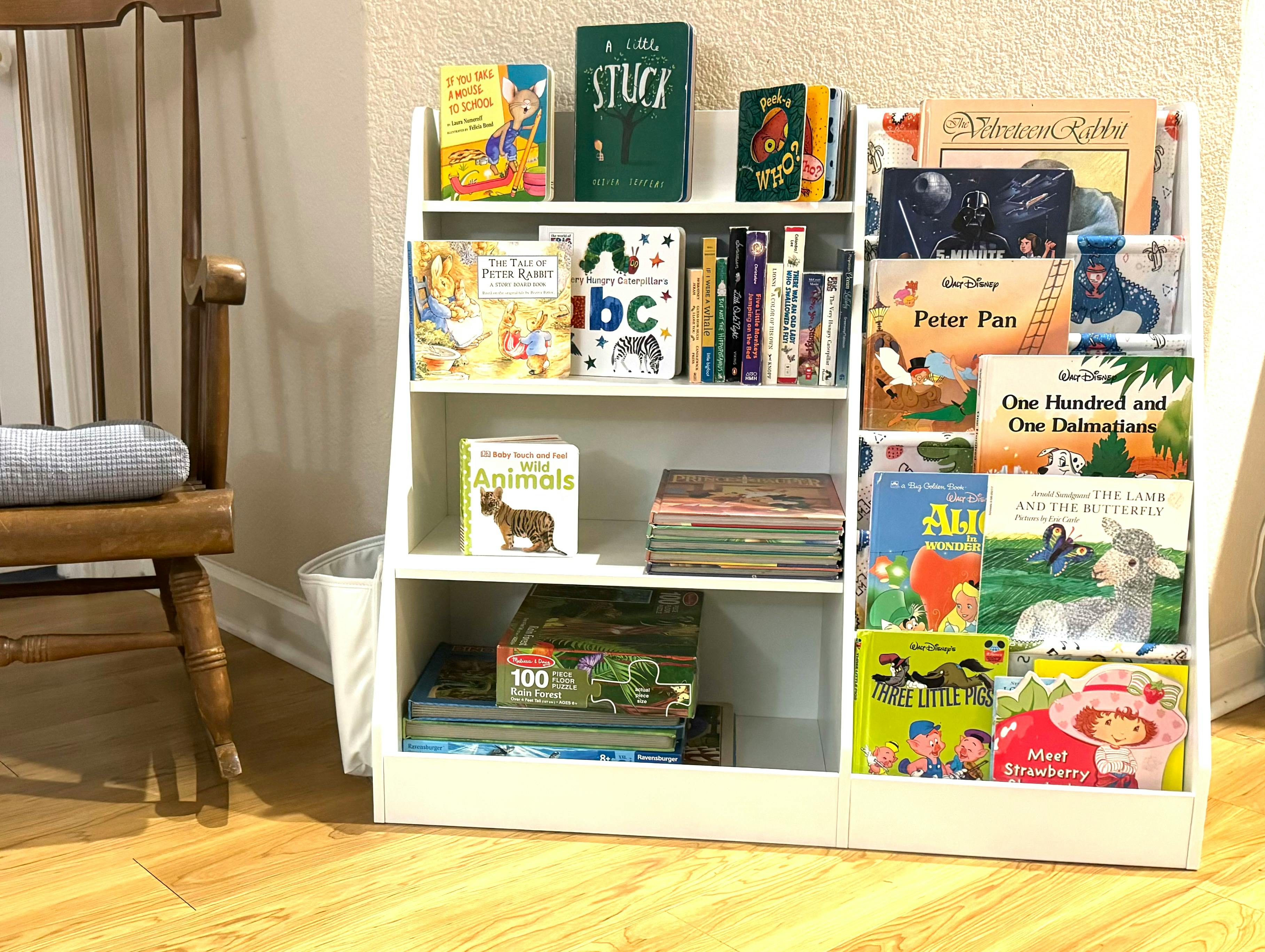 White bookshelf filled with children's books
