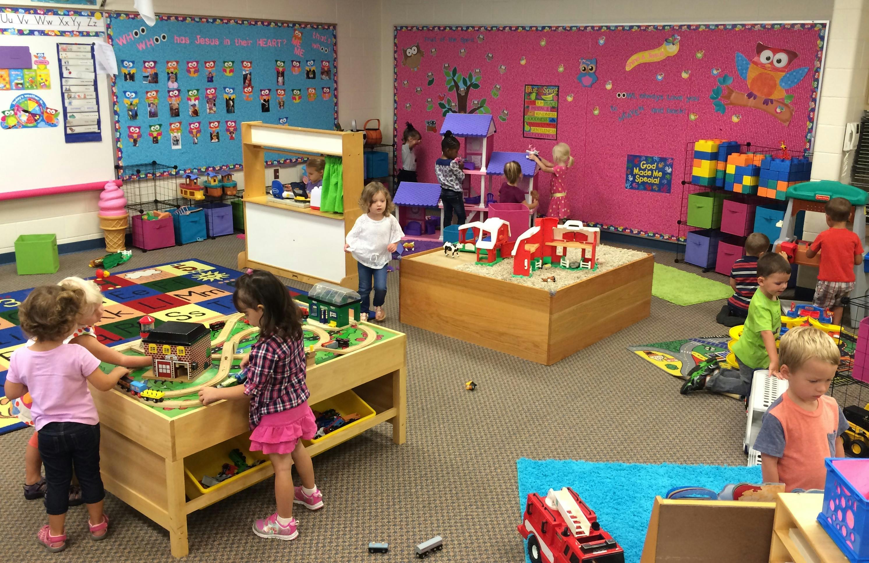 Children playing with toys in a classroom