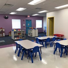 Classroom with small tables and chairs