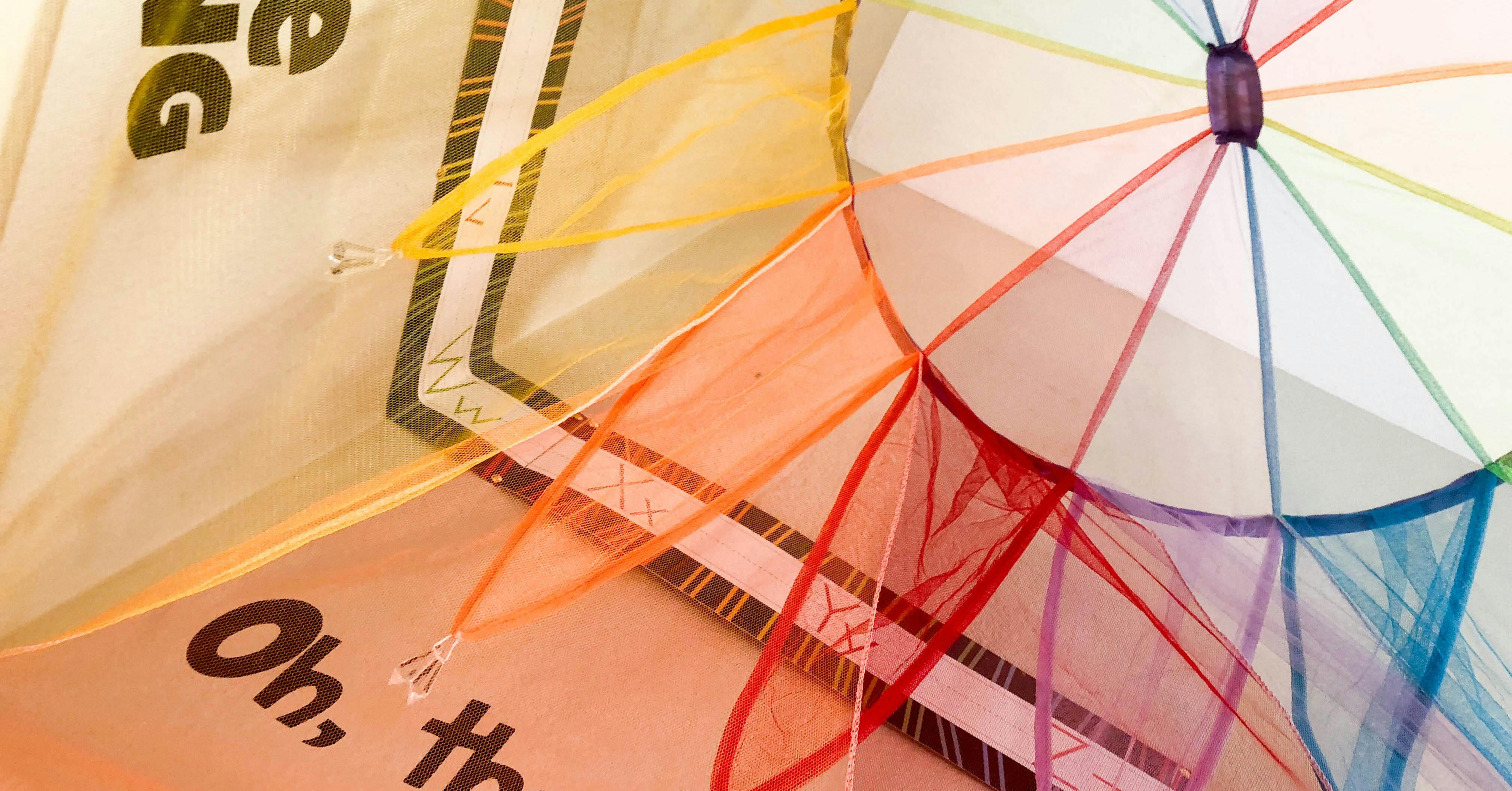 Rainbow colored parachute toy