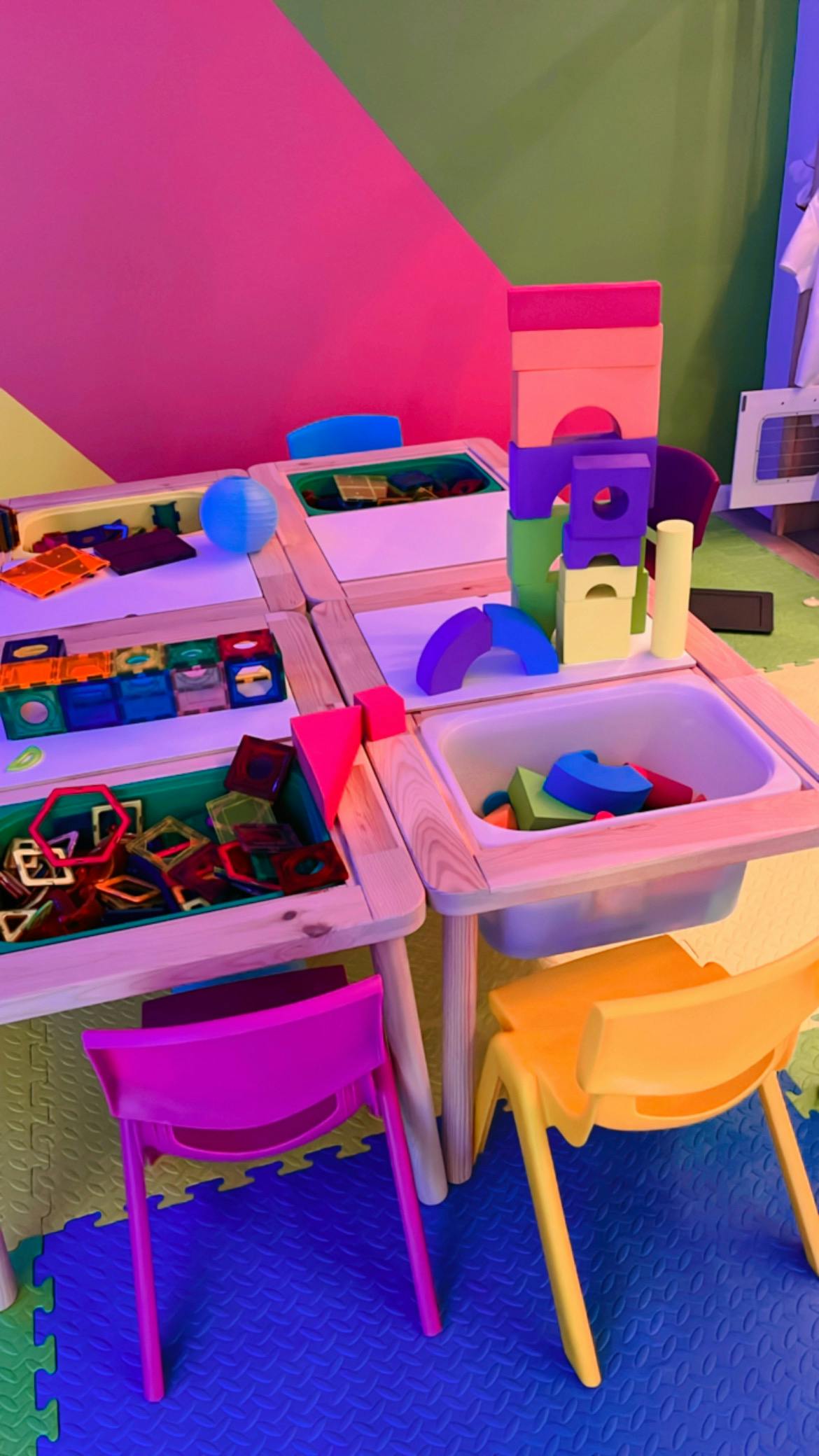 Children's play table with building blocks and magnetic tiles