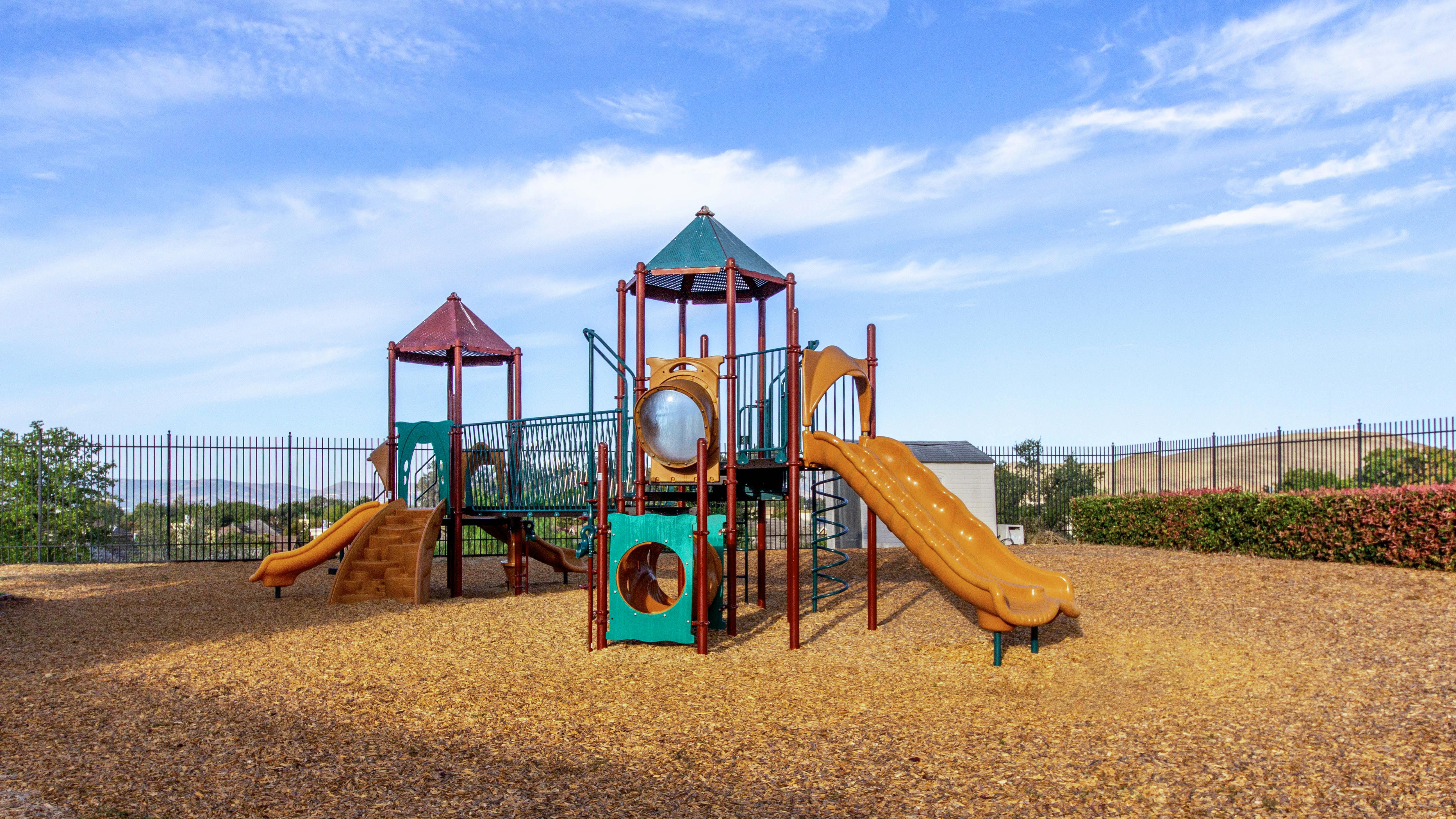 Playground with slides and climbing structures