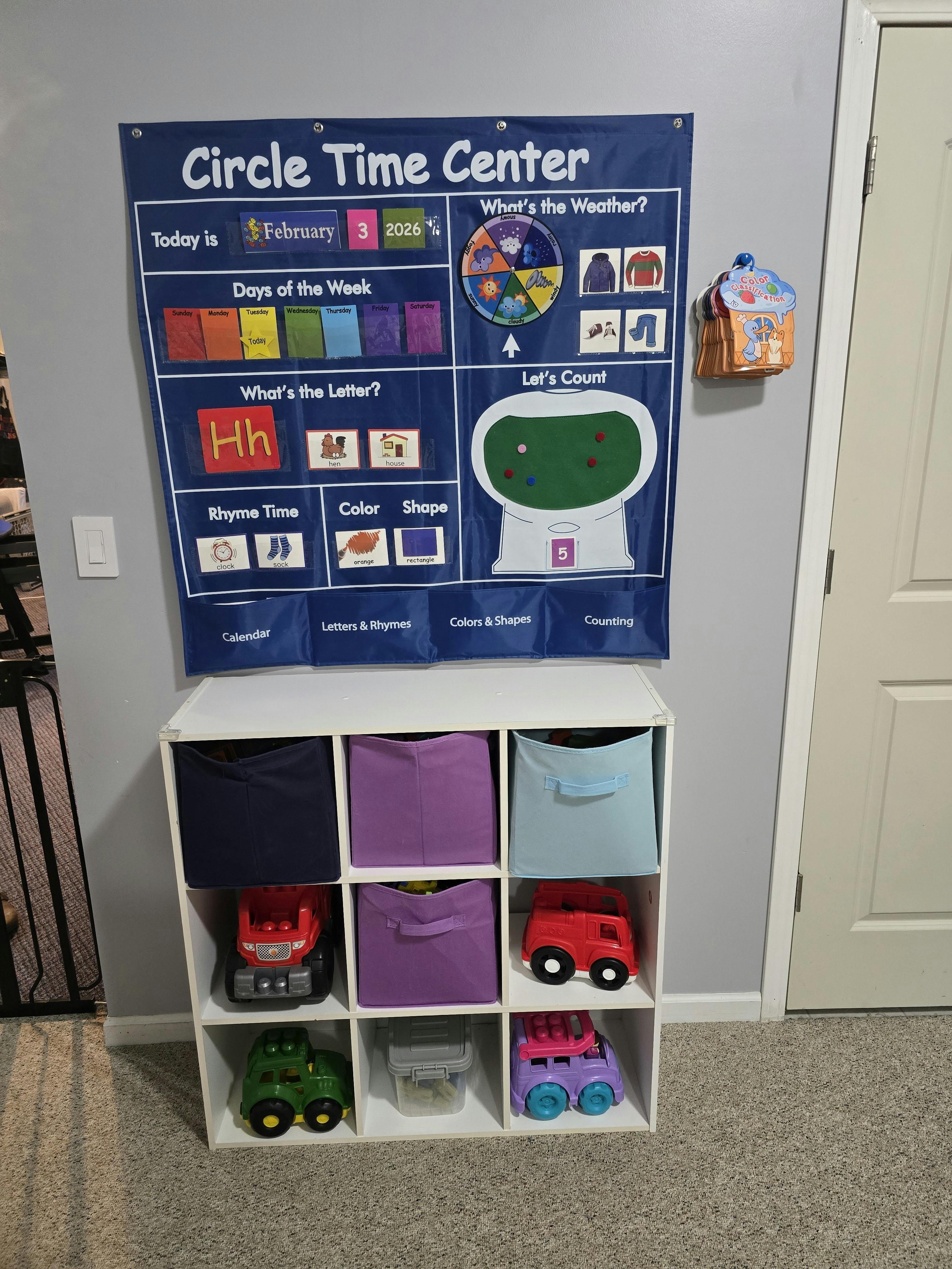 Circle Time Center calendar on a wall above a toy organizer