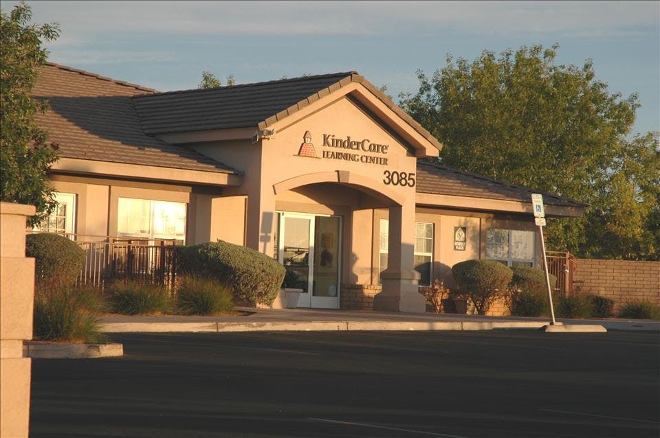 KinderCare Learning Center building entrance with "3085" above the door