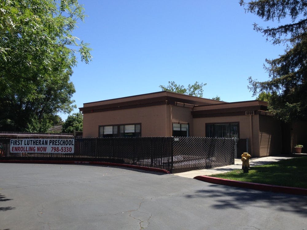 First Lutheran Preschool building with a sign that reads "First Lutheran Preschool"