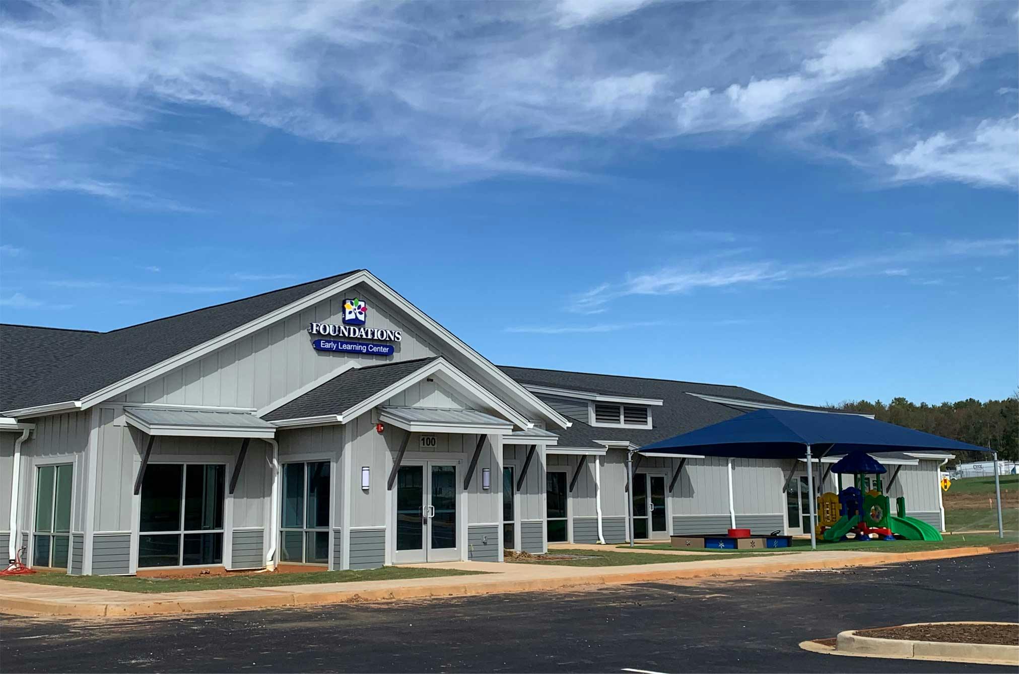 Building with a sign that reads "Foundations Early Learning Center"