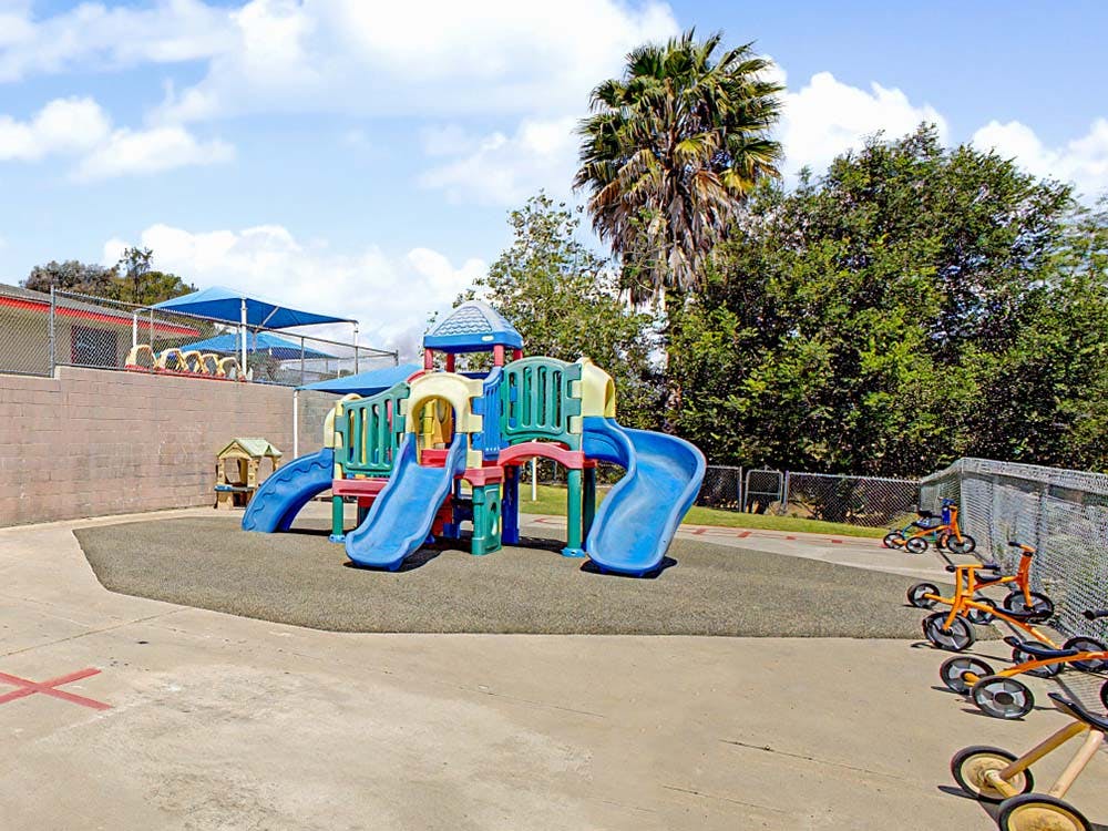 Playground with slides and tricycles