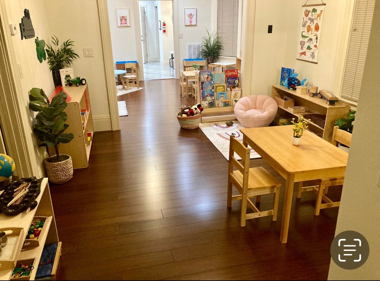 Children's classroom with small wooden table and chairs