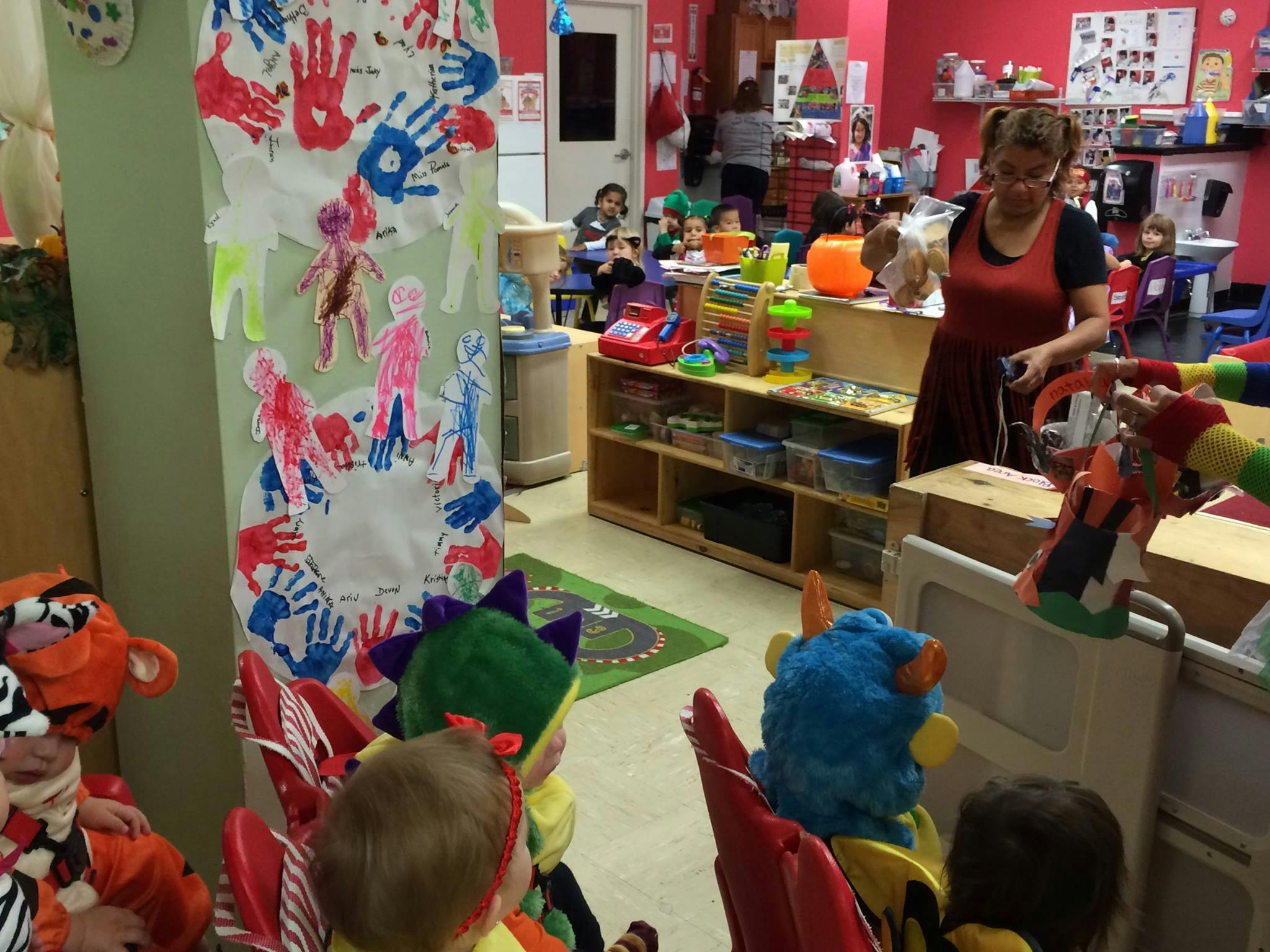 Adult and children in a classroom