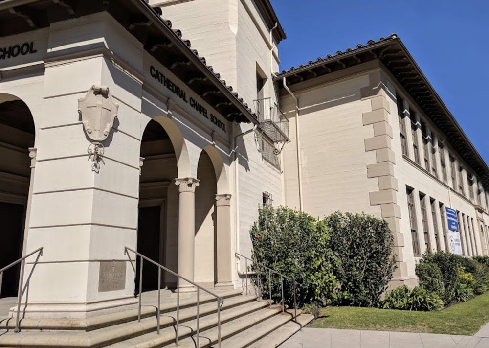 Entrance to Cathedral Chapel School with arched doorways and steps