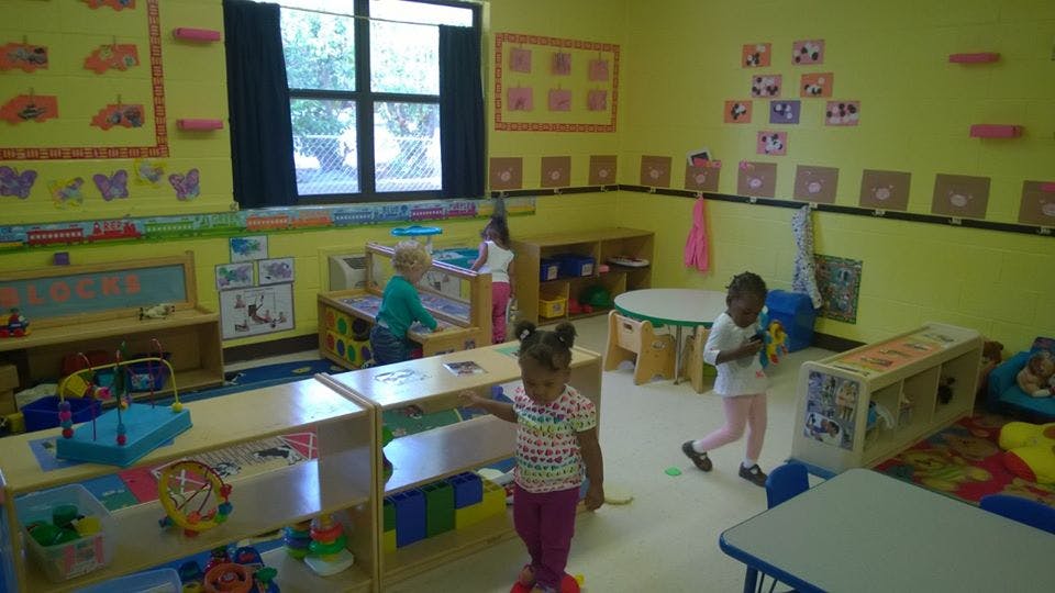 Children playing in a classroom