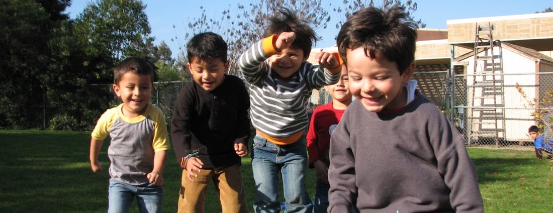 Four children playing outdoors