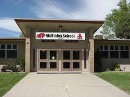 McKinley School building entrance with sign above sign