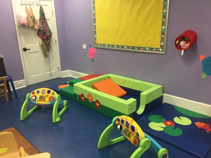 Playroom with soft play equipment and activity mats