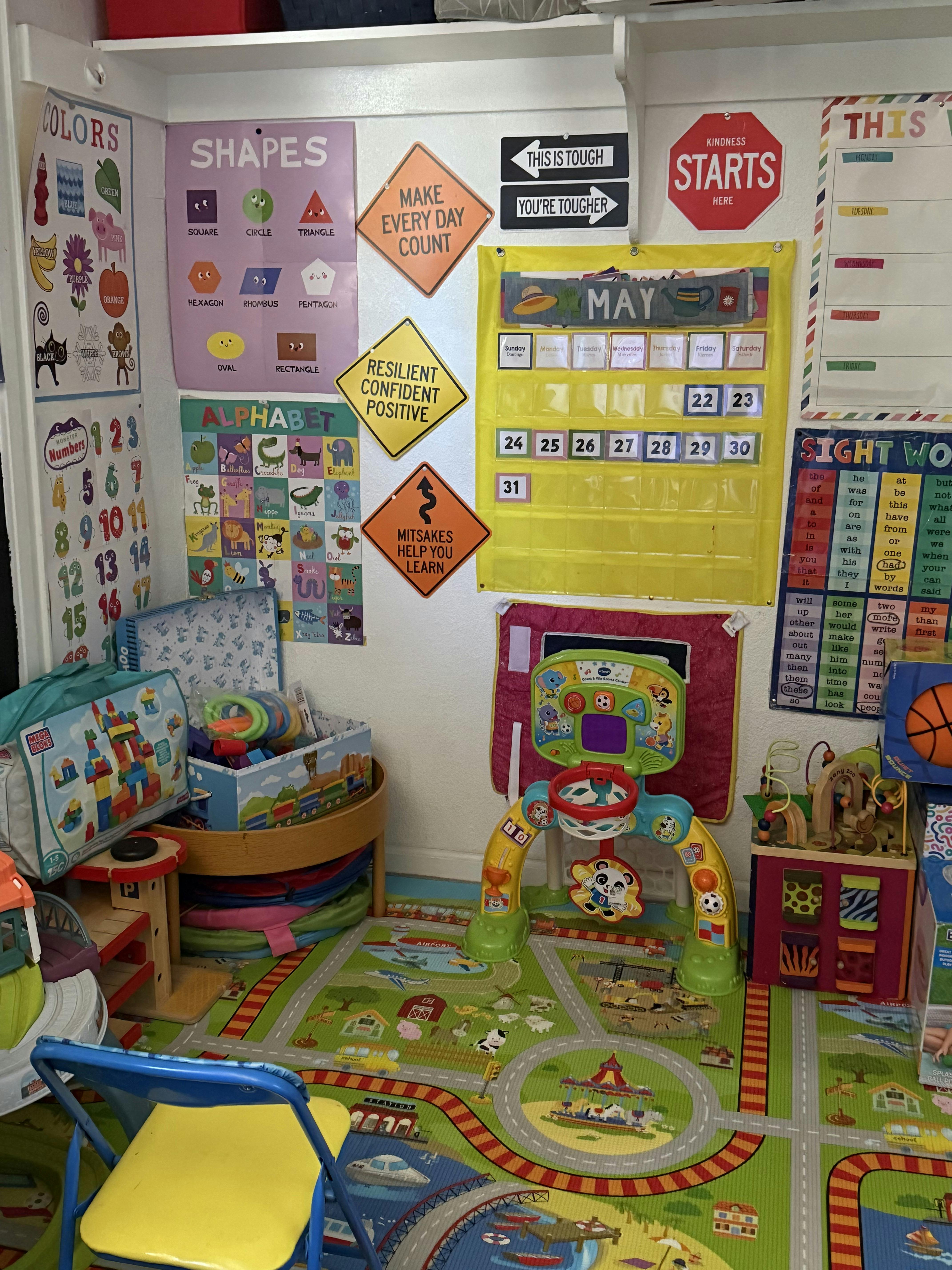 Educational wall posters and toys in a children's play area