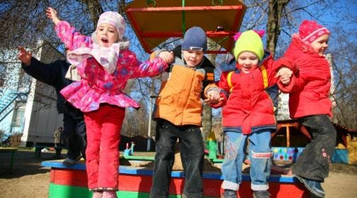 Four children playing outdoors