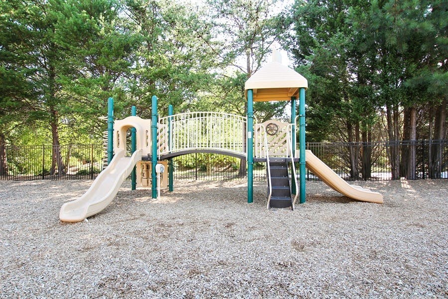 Playground with slides and a bridge