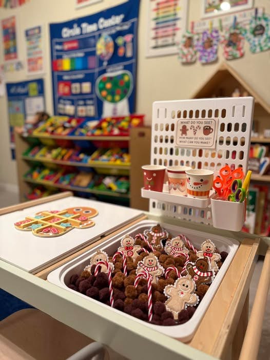 Gingerbread people and candy canes in a sensory bin