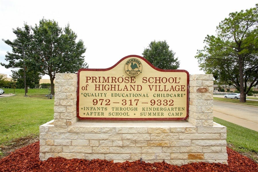 Primrose School of Highland Village sign with phone number and services
