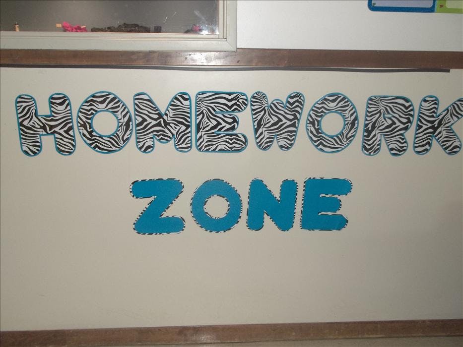 Decorative letters spelling out "HOMEWORK ZONE" on a light-colored wall