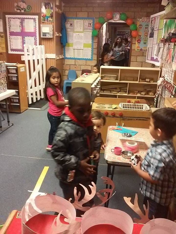 Children playing in a classroom
