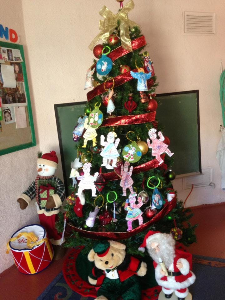Decorated Christmas tree with ornaments and holiday figures