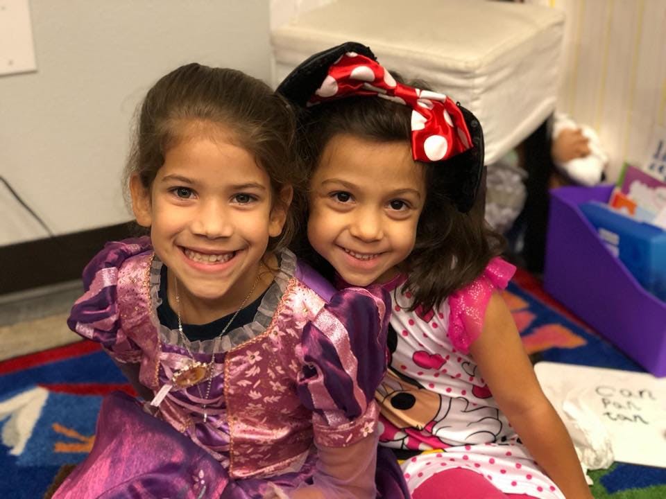 Two children in costumes