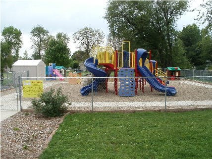 Playground with slides and climbing structures