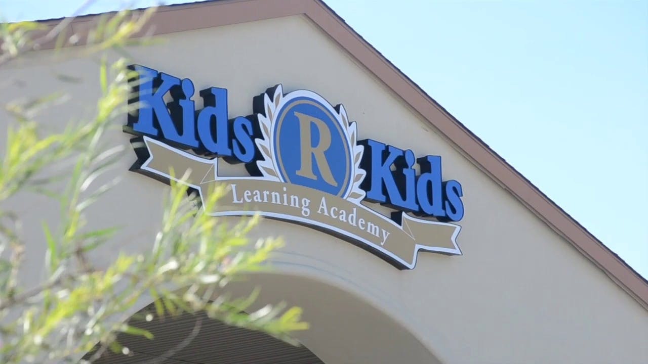 Kids R Kids Learning Academy sign on a building