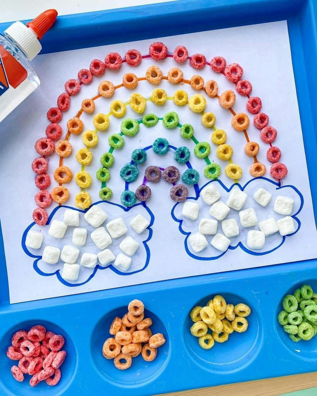 Rainbow craft made from colorful cereal and marshmallows