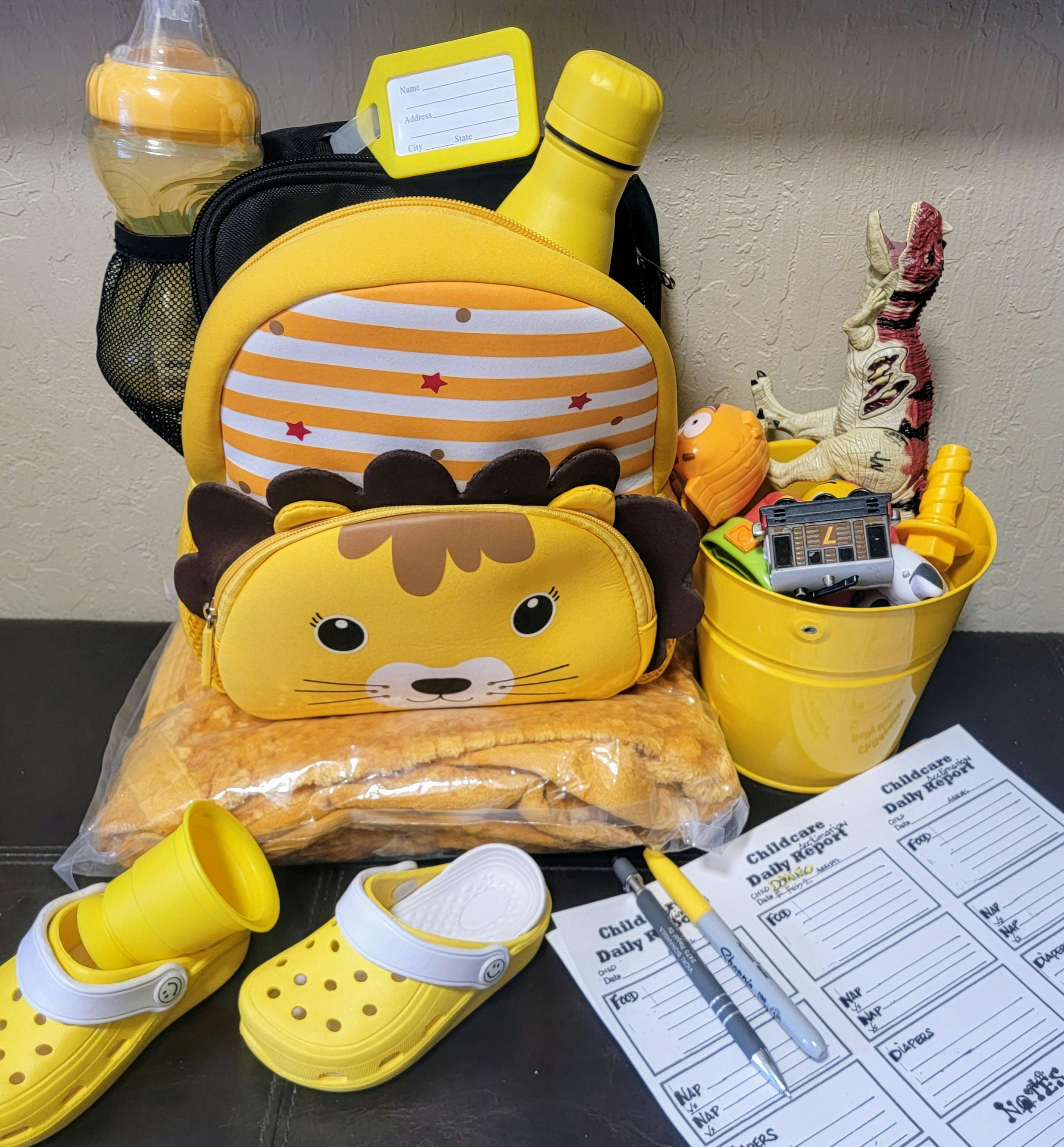 Child's backpack, shoes, toys, and daily report form