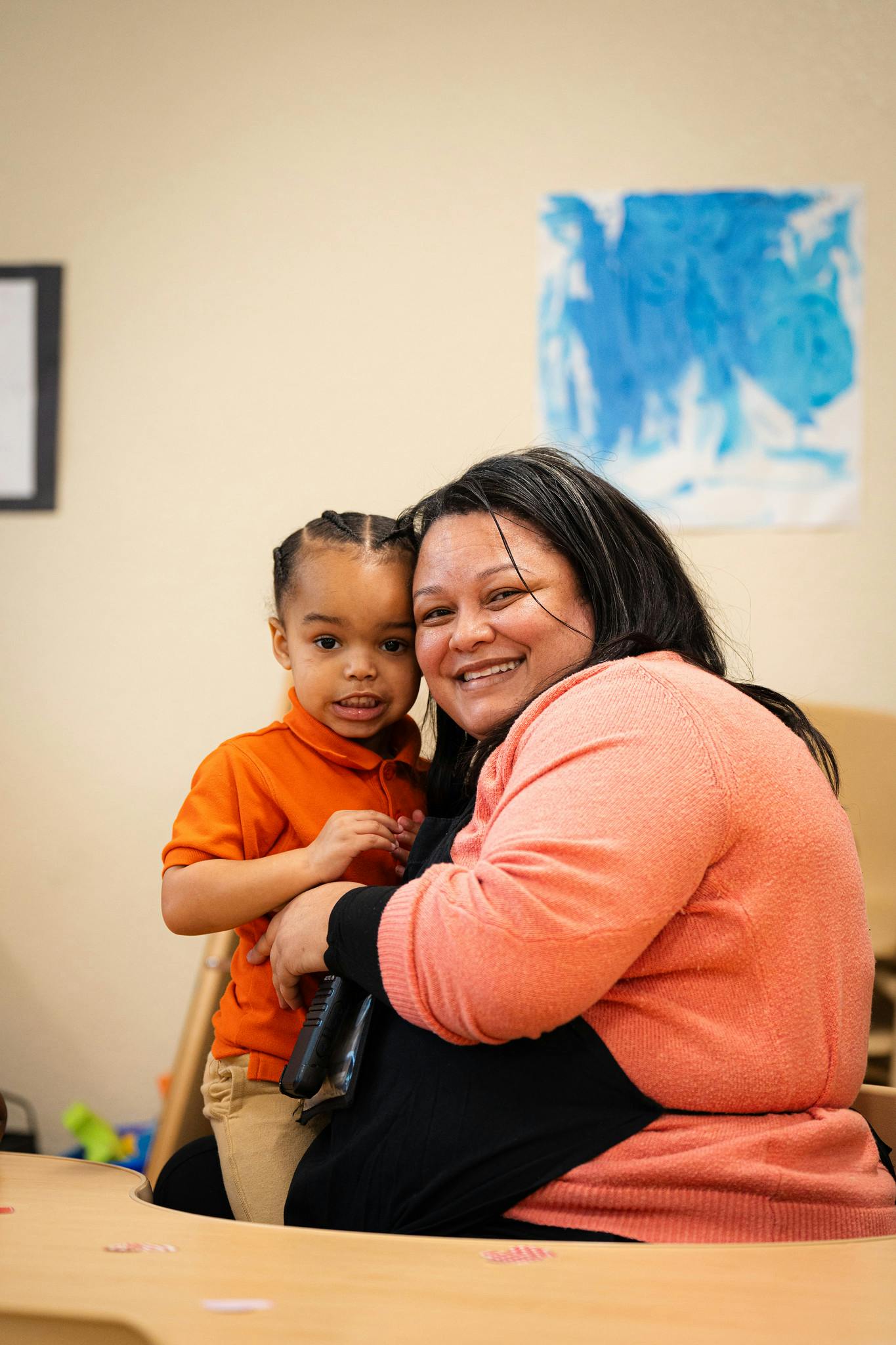 Person and child smiling