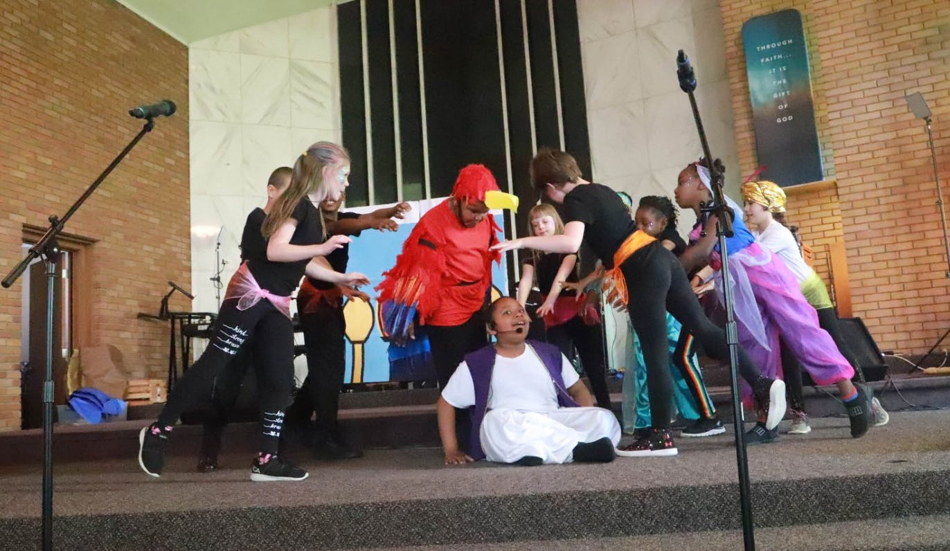 Group of people performing on a stage