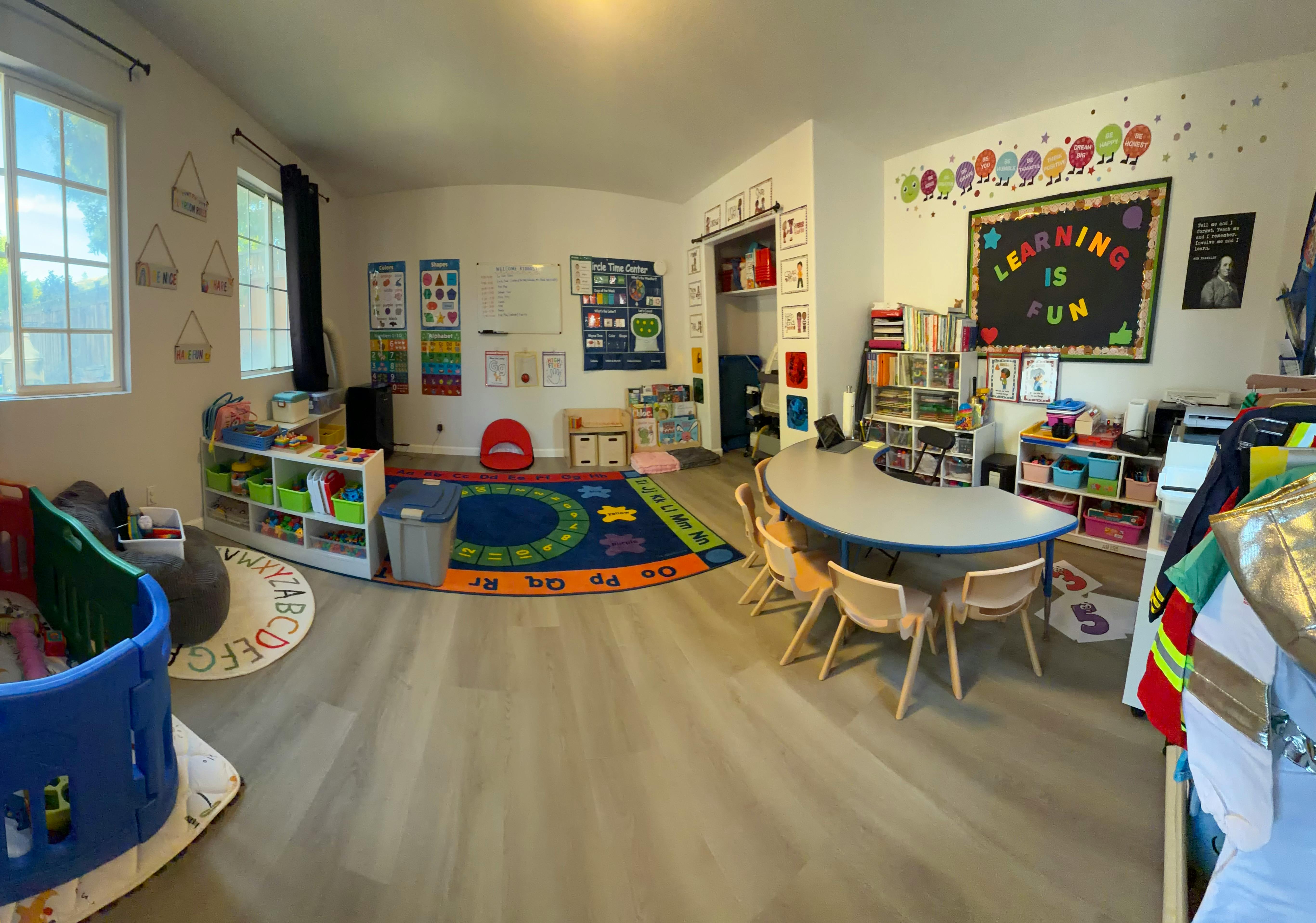 Classroom interior with educational wall decor and play area