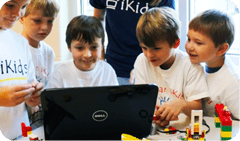 Children looking at a laptop