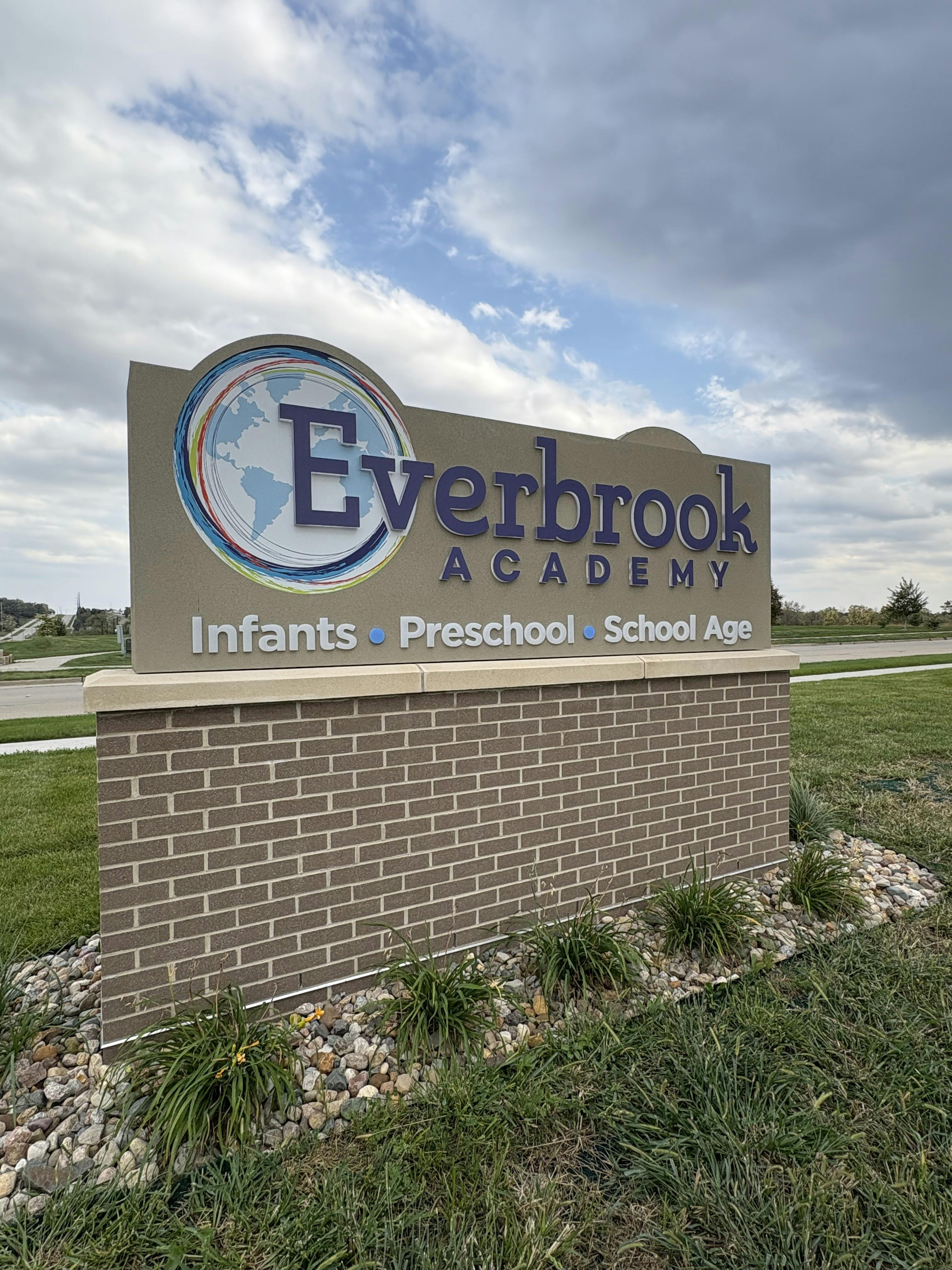 Everbrook Academy sign with Infants, Preschool, School Age