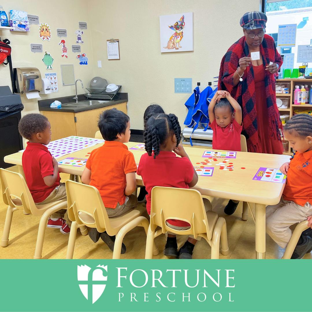 Adult and children in a classroom