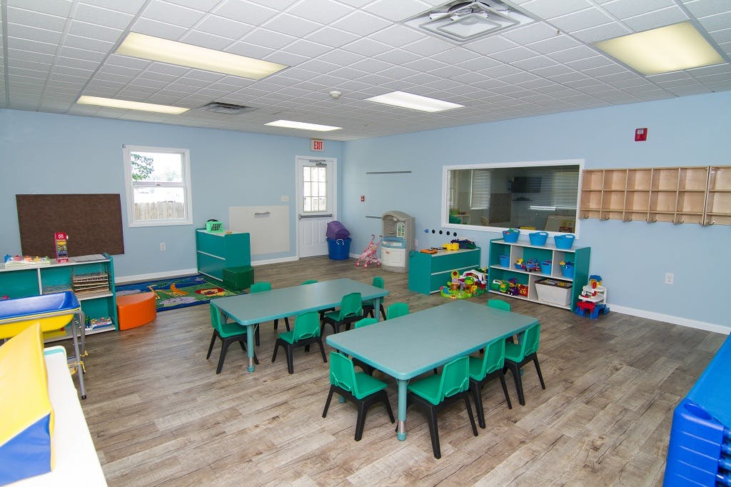 Classroom with small tables and chairs