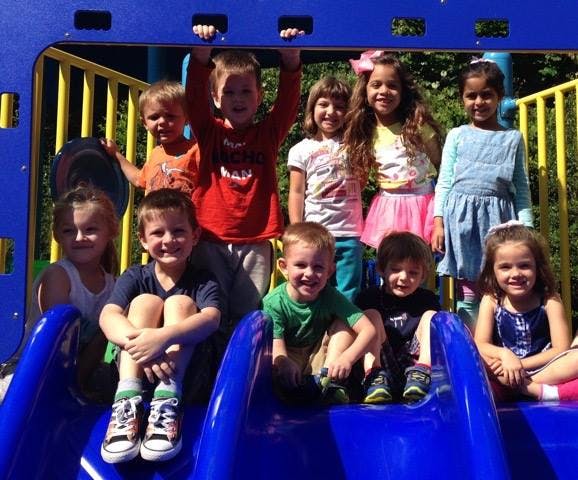 Group of children on a playground structure