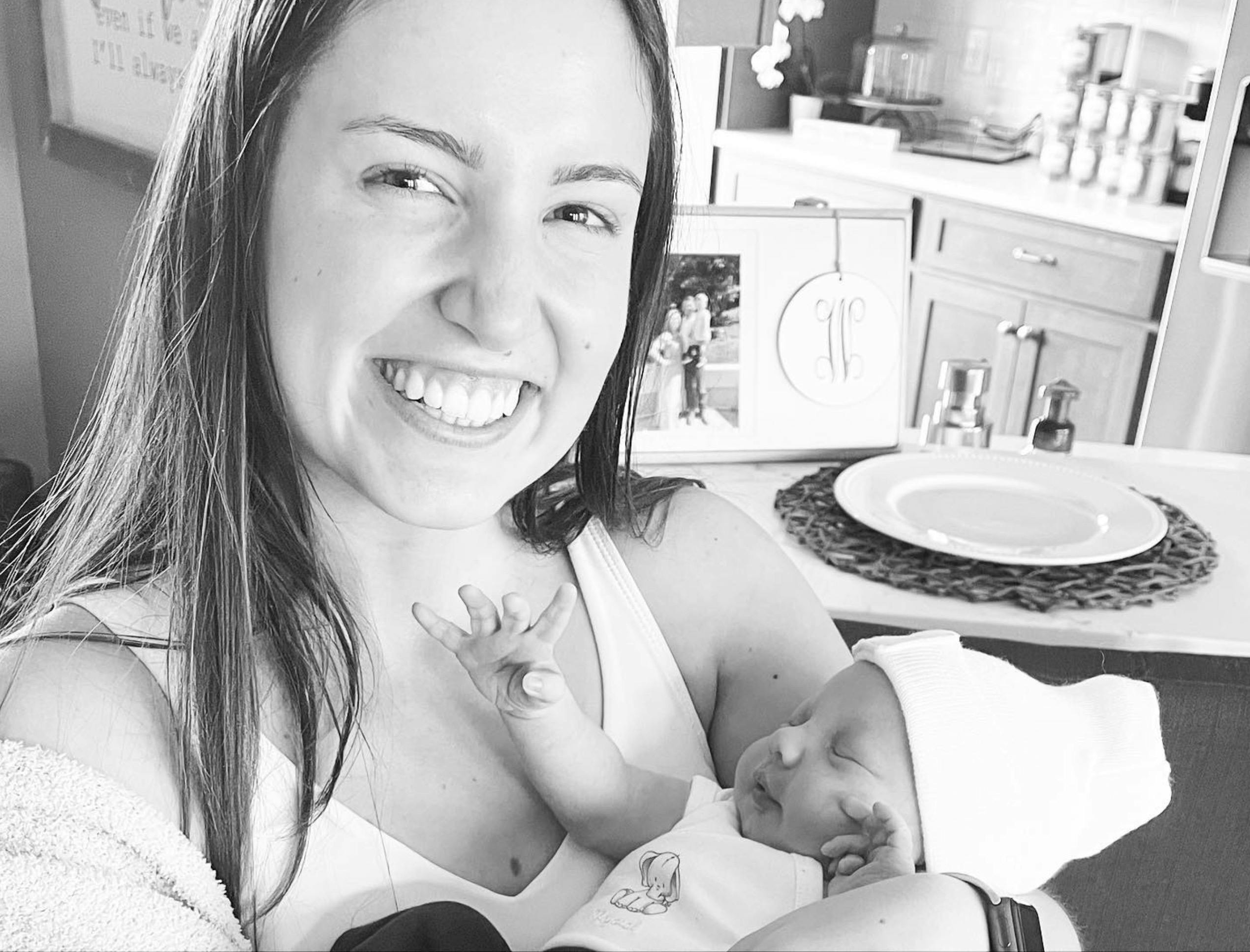 Person holding a sleeping infant