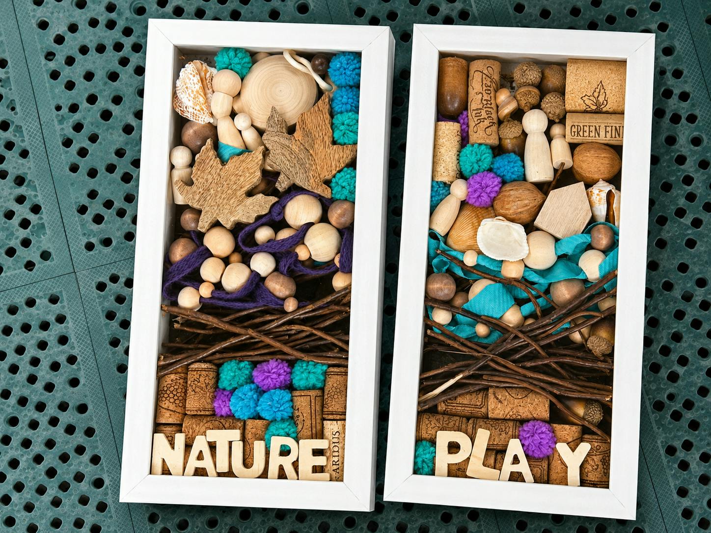 Two rectangular display boxes containing natural objects and the words Nature Play