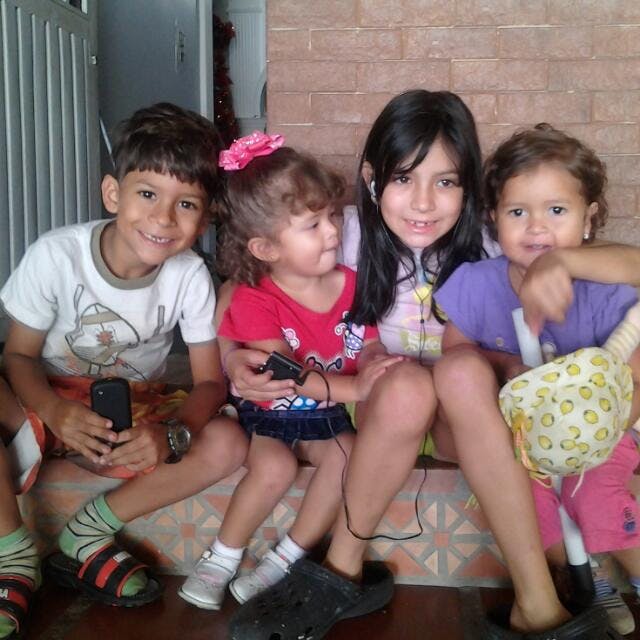 Four children sitting together