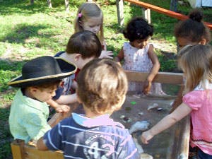 Group of children playing in a sandbox