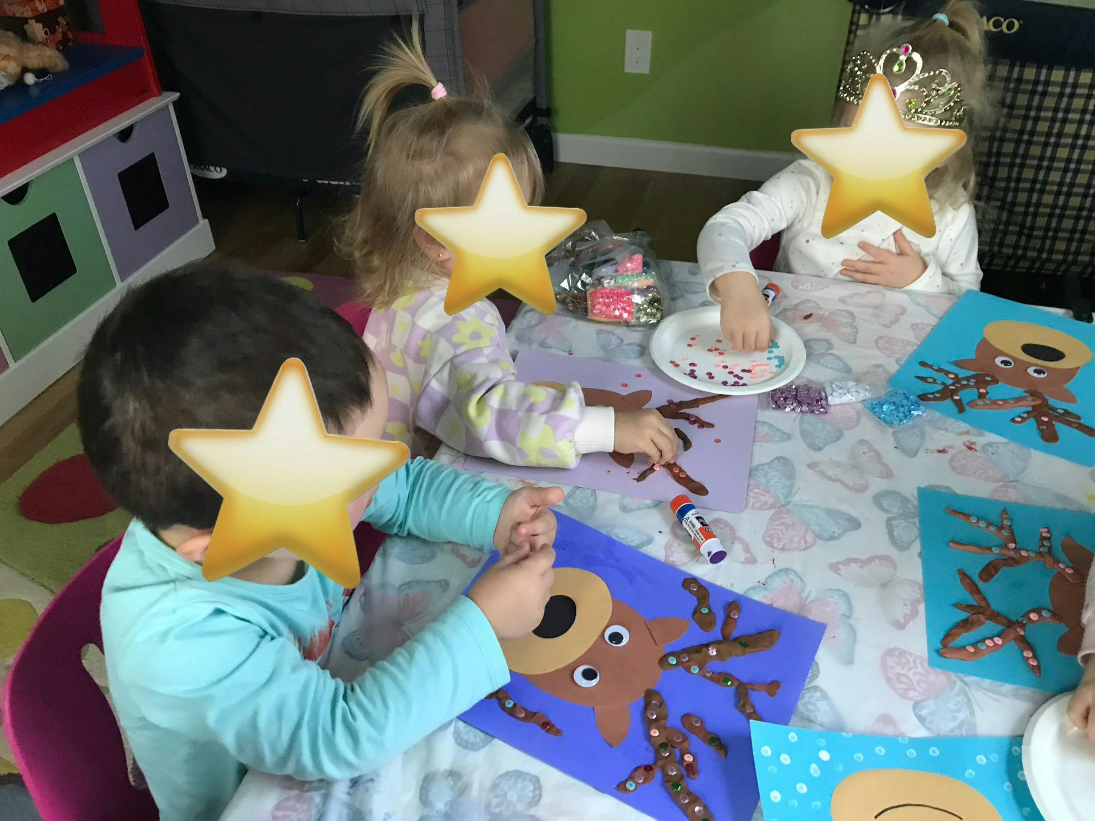 Children doing crafts at a table