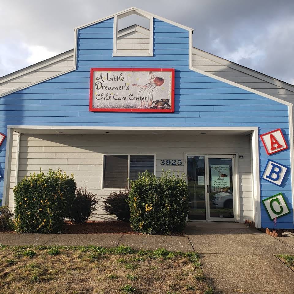 Building with sign "A Little Dreamer's Child Care Center"