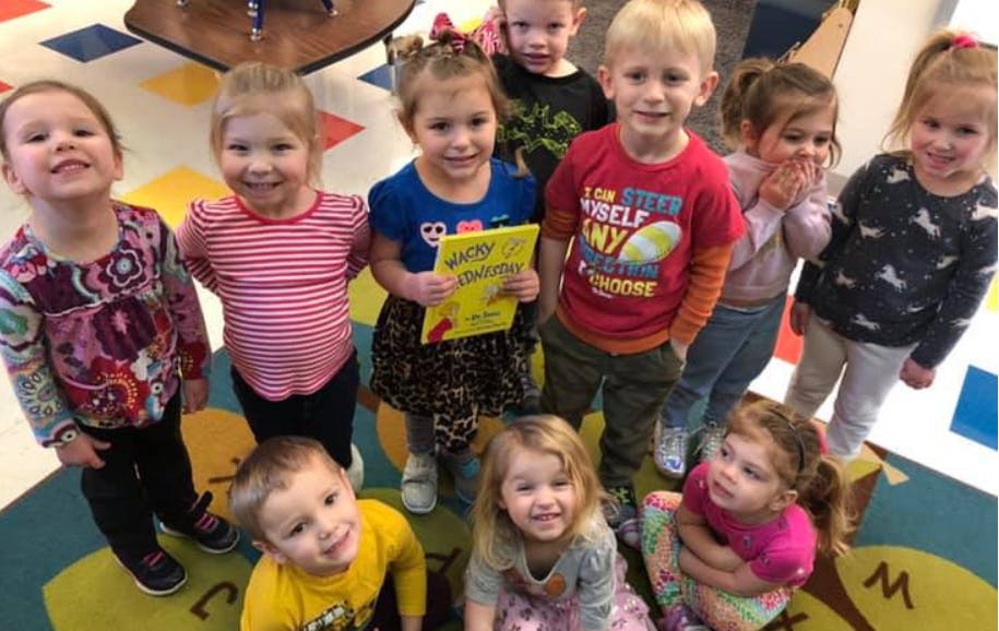 Group of children looking up at the camera