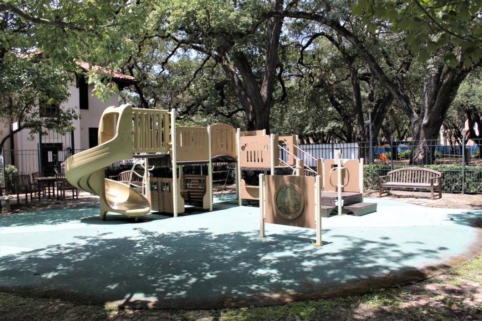 Playground with slides and climbing structures