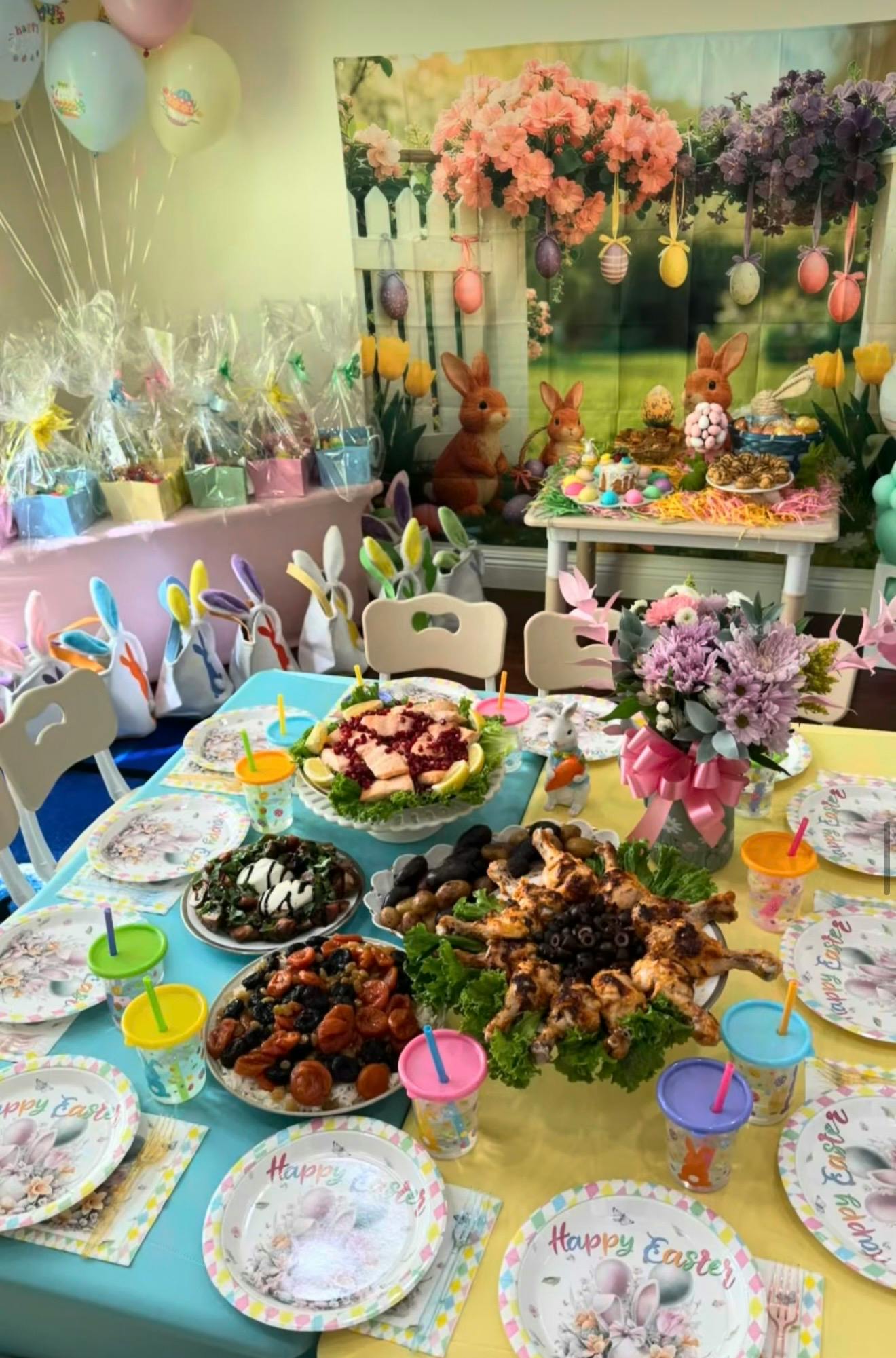 A festive table set for an Easter celebration with plates and food dishes