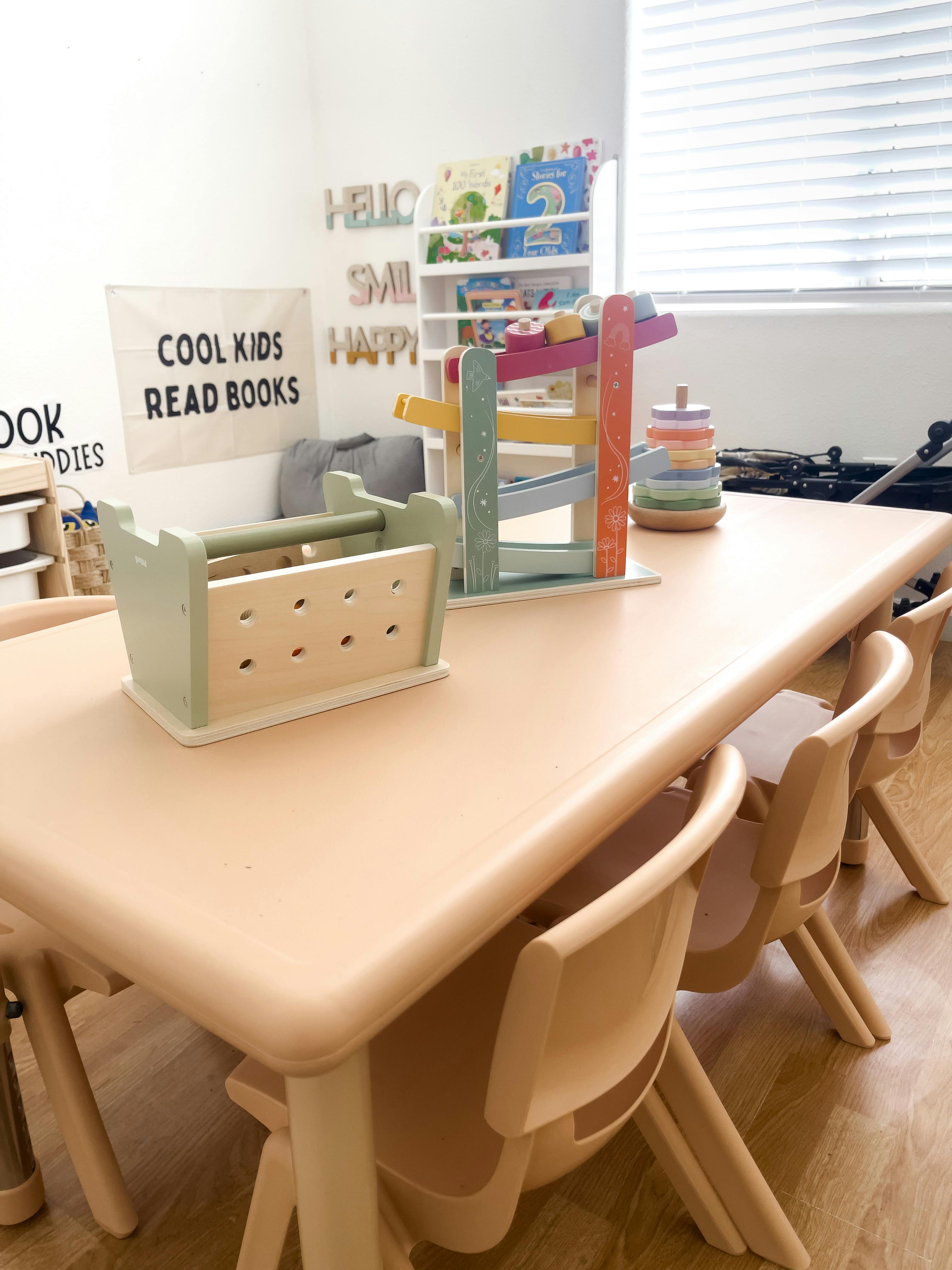 Children's table with toys and chairs in a classroom